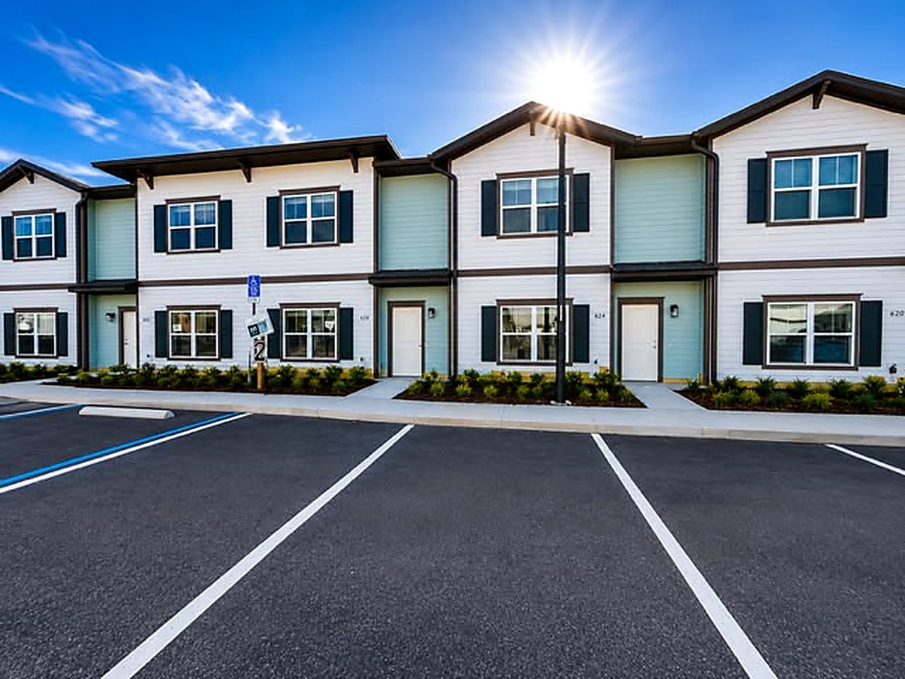 An entire row of completed townhome buildings offered under single ownership in Davenport, Florida