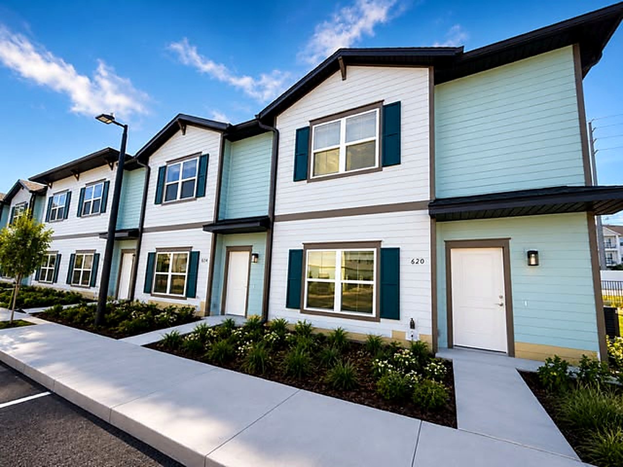 Private entries and finished walkways at the 82-unit Central Florida townhome community