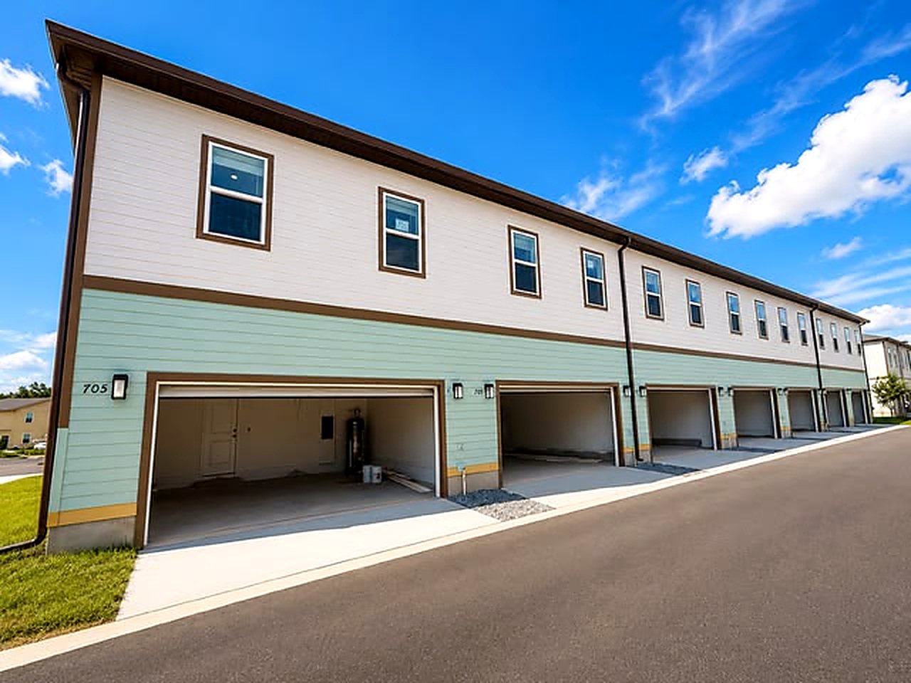 Attached two-car garages serving 52 of the 82 townhome residences