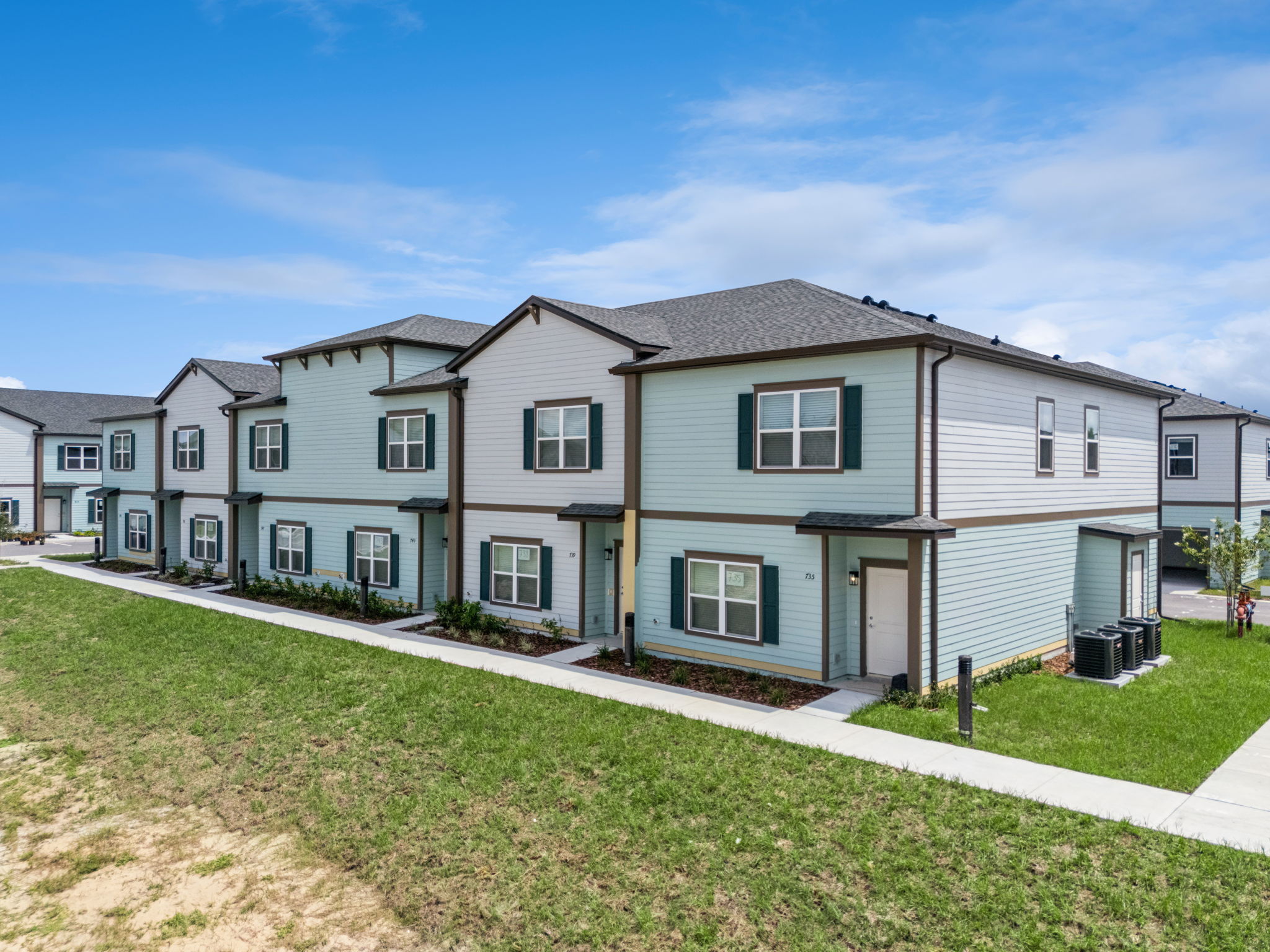 Completed corner townhome building