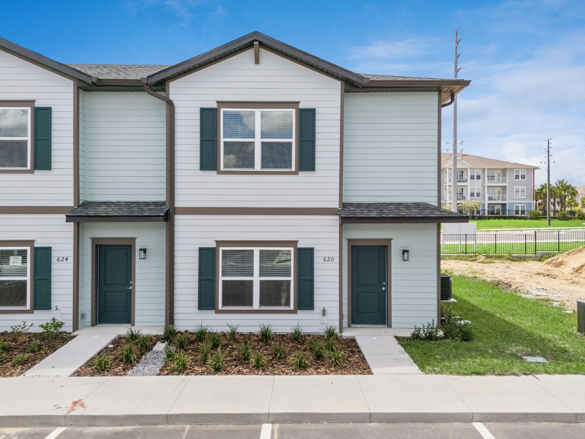 Representative front elevation of a completed townhome